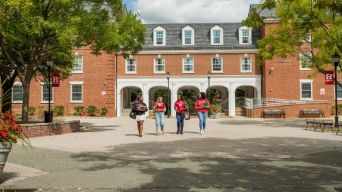 Rutgers students walking across the courtyard